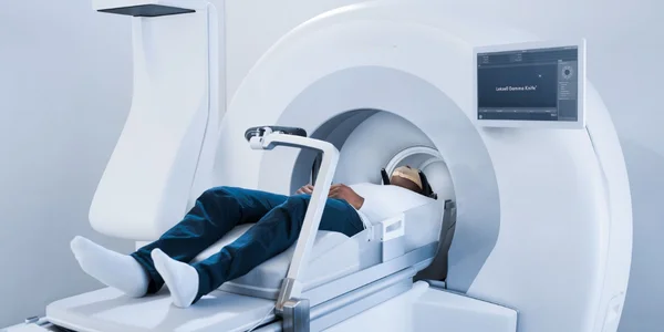 Diagram of focused gamma radiation beams targeting a brain lesion with sub-millimeter precision